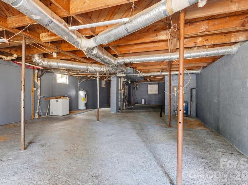 75 Old Macedonia Road, Alexander, NC 28701.  MLS# CAR4364302, YatesRealty ID 23812. Basement