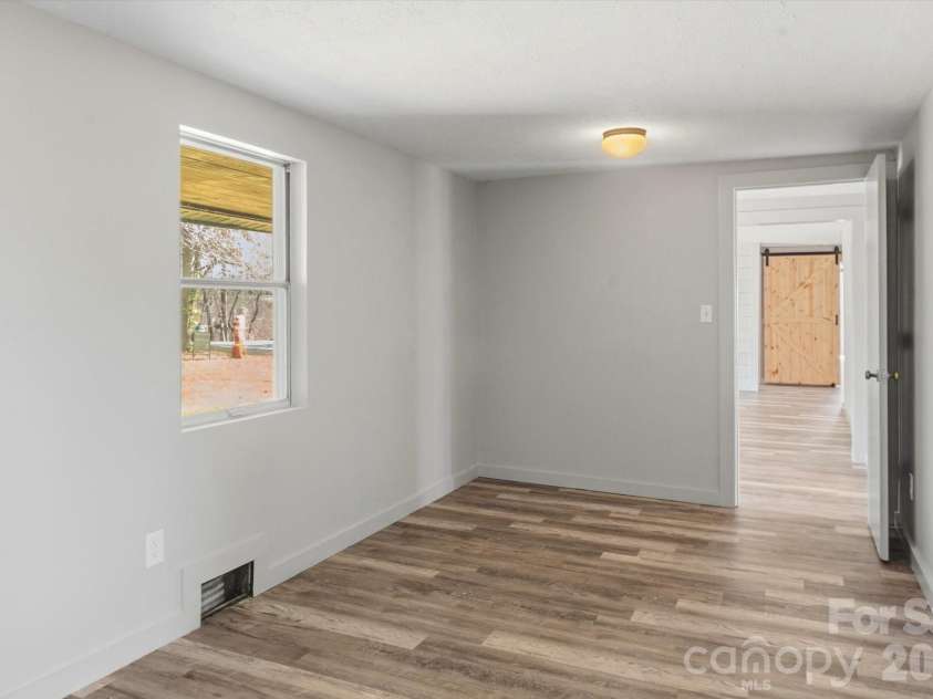 75 Old Macedonia Road, Alexander, NC 28701.  MLS# CAR4364302, YatesRealty ID 23812. Bedroom #3 with huge closet 