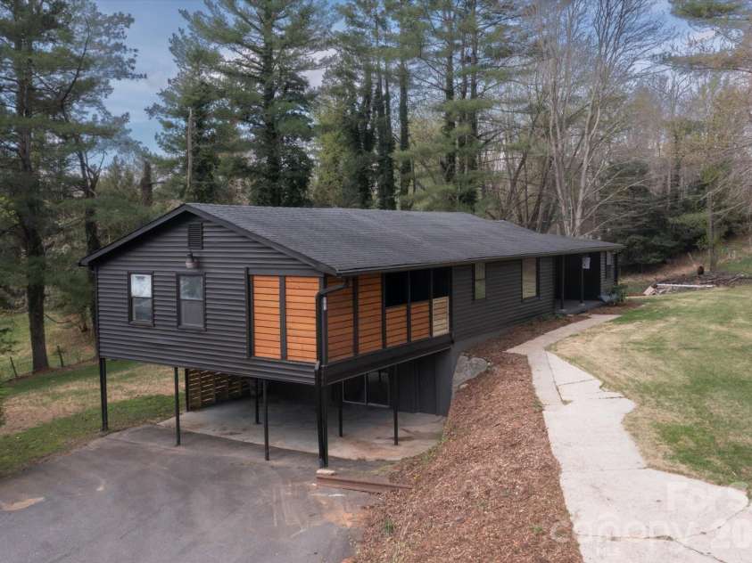 75 Old Macedonia Road, Alexander, NC 28701.  MLS# CAR4364302, YatesRealty ID 23812. Carport, house, & 2 driveways