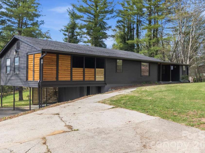 75 Old Macedonia Road, Alexander, NC 28701.  MLS# CAR4364302, YatesRealty ID 23812. Carport & house