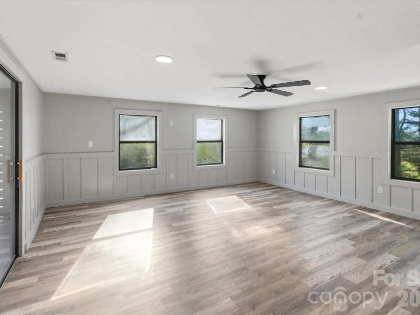 75 Old Macedonia Road, Alexander, NC 28701.  MLS# CAR4364302, YatesRealty ID 23812. Huge Primary Bedroom!