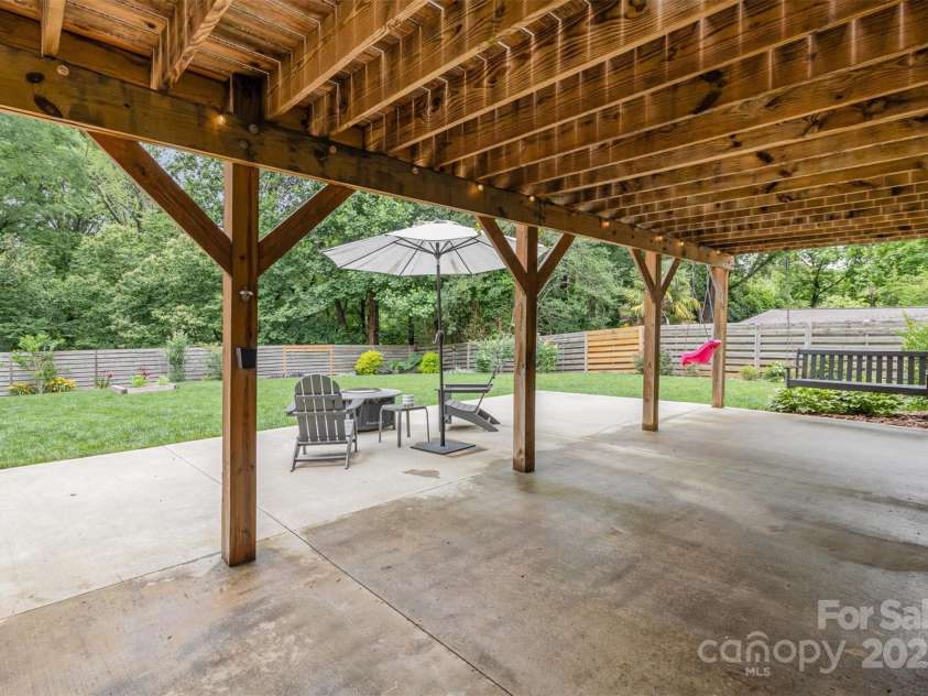 1621 Brookdale Avenue, Charlotte, NC 28210.  MLS# CAR4262821, YatesRealty ID 23813. Patio under deck