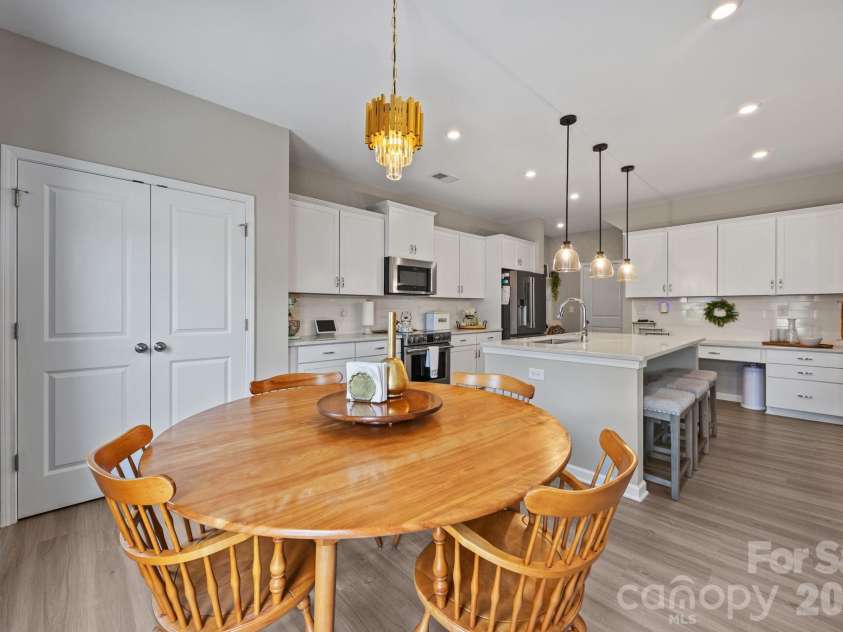 526 Ardsley Drive, Locust, NC 28097.  MLS# CAR4377039, YatesRealty ID 23814. Double door pantry at 526 Ardsley Dr, Locust