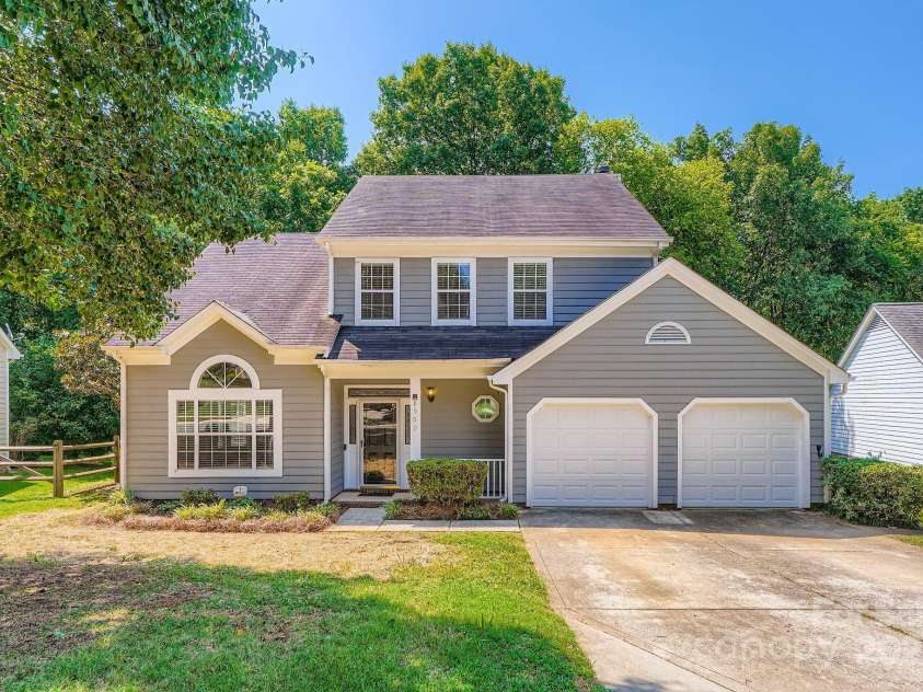 8909 Elkins Park Drive, Matthews, NC 28105.  MLS# CAR4275942, YatesRealty ID 23818. Charming 3 bedroom, 2.5 bath home surrounded by mature trees.