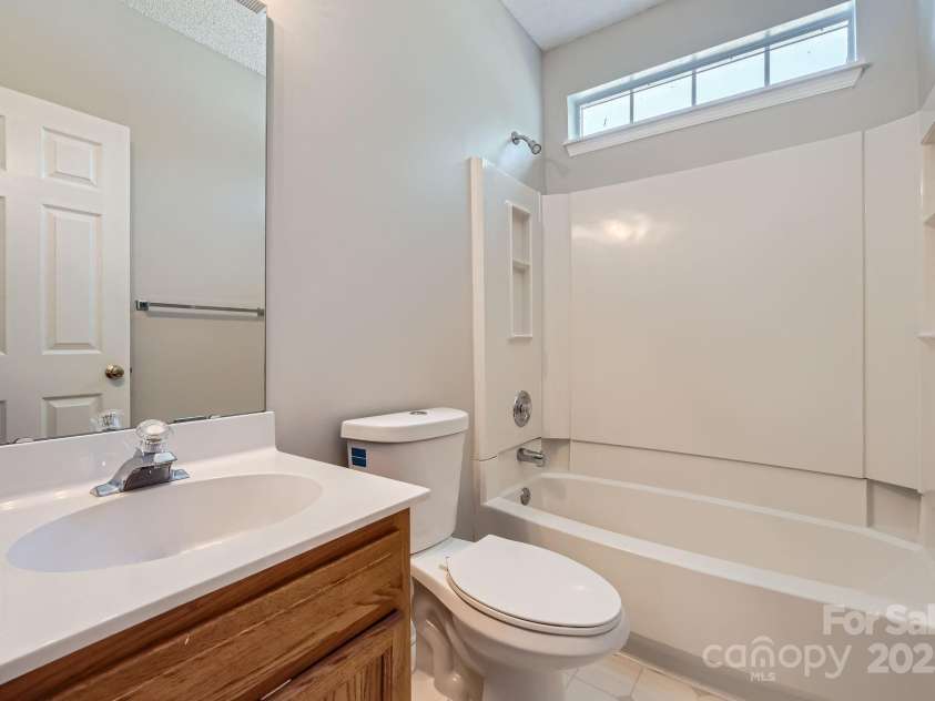 8909 Elkins Park Drive, Matthews, NC 28105.  MLS# CAR4275942, YatesRealty ID 23818. Hall bath