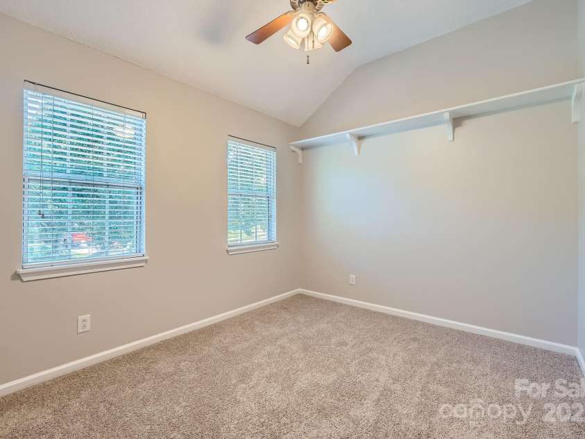 8909 Elkins Park Drive, Matthews, NC 28105.  MLS# CAR4275942, YatesRealty ID 23818. Spacious secondary bedrooms - Bedroom 2