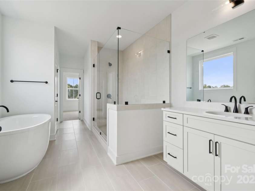 5111 Mint Harbor Way, Charlotte, NC 28269.  MLS# CAR4326116, YatesRealty ID 2382. Primary bathroom