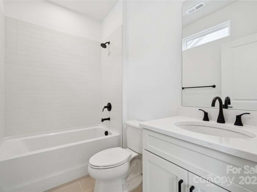 5111 Mint Harbor Way, Charlotte, NC 28269.  MLS# CAR4326116, YatesRealty ID 2382. Secondary bath 