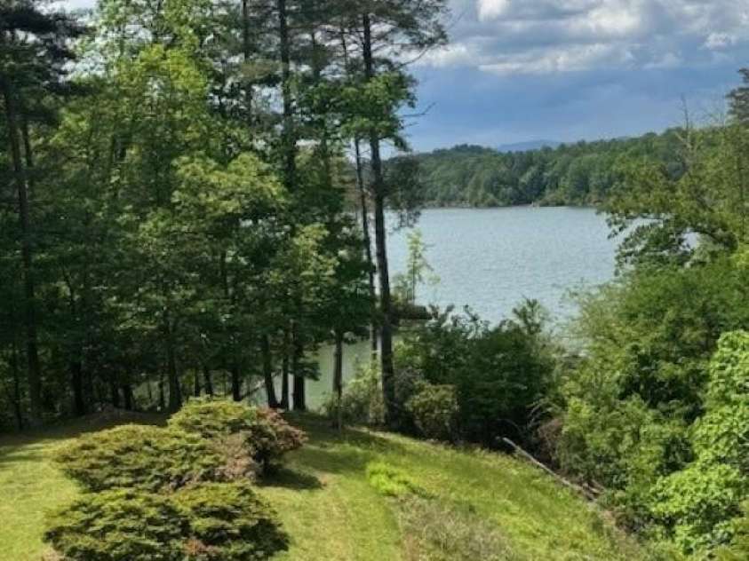 240 Goshen Terrace, Wilkesboro, NC 28697.  MLS# CAR4262846, YatesRealty ID 23821. Backyard view of Kerr Scott Lake