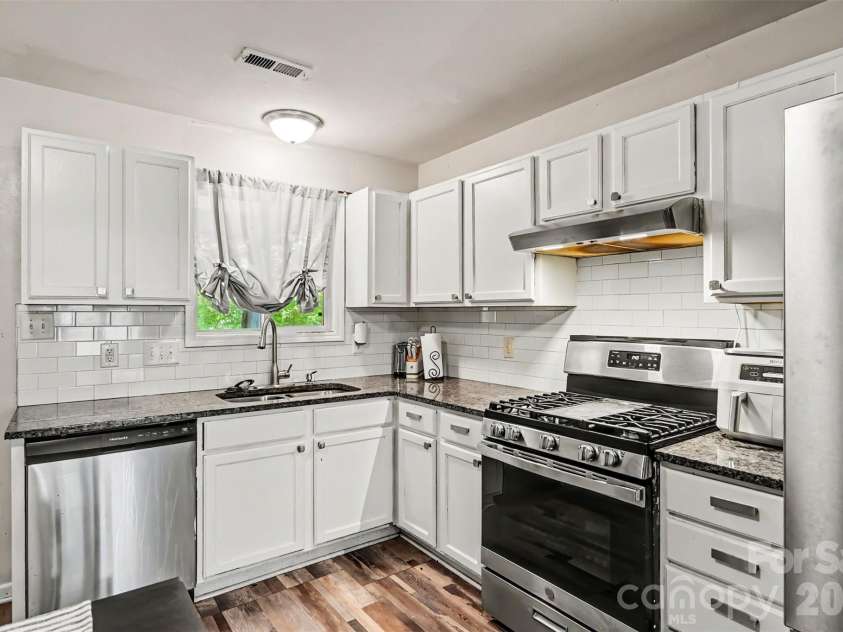 9306 Tiger Lily Lane, Charlotte, NC 28215.  MLS# CAR4380483, YatesRealty ID 23821. 