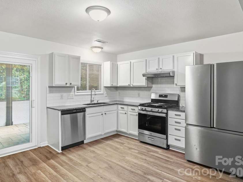 9306 Tiger Lily Lane, Charlotte, NC 28215.  MLS# CAR4429483, YatesRealty ID 23821. 