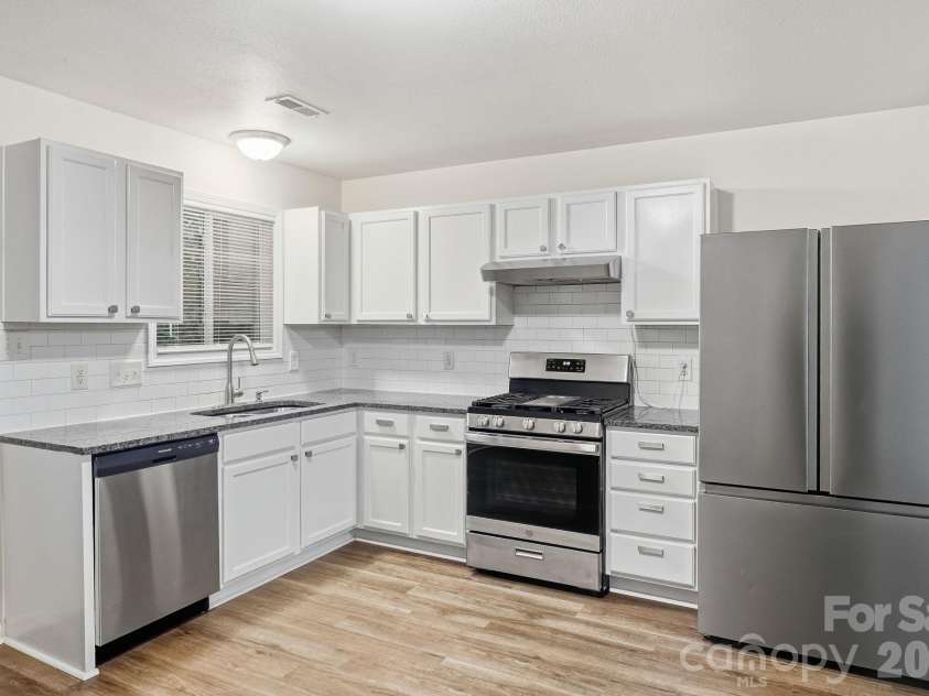 9306 Tiger Lily Lane, Charlotte, NC 28215.  MLS# CAR4429483, YatesRealty ID 23821. 