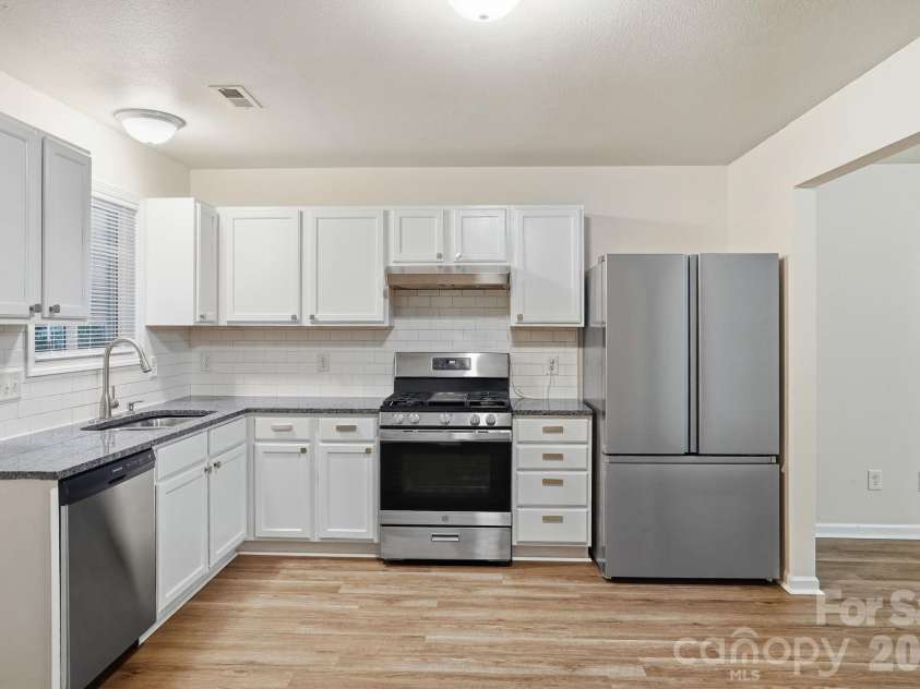 9306 Tiger Lily Lane, Charlotte, NC 28215.  MLS# CAR4429483, YatesRealty ID 23821. 