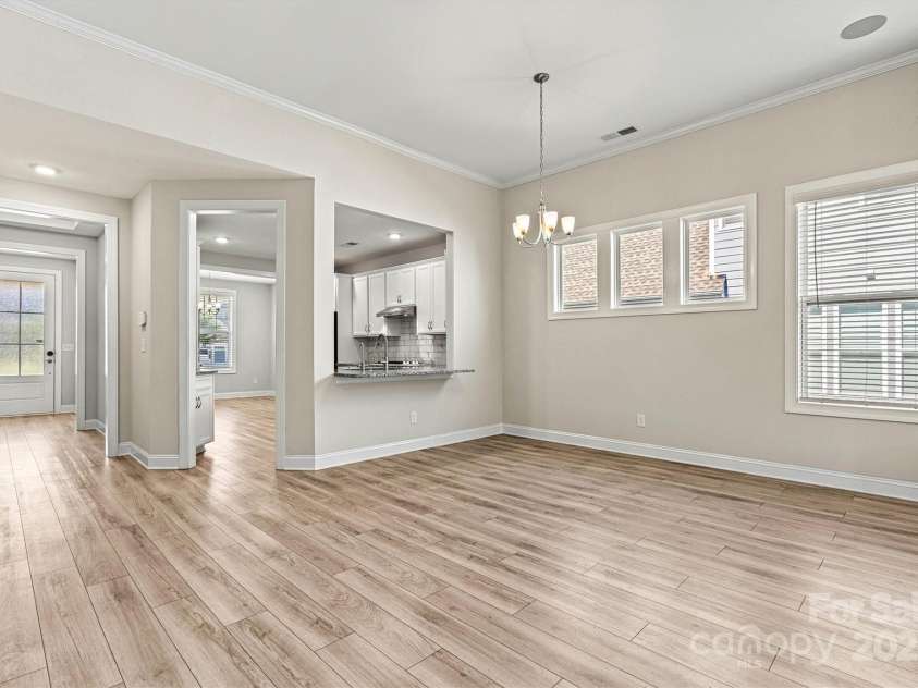 7315 Surprise Court, Charlotte, NC 28215.  MLS# CAR4276101, YatesRealty ID 23823. A more formal dining space is conveniently located just off the Kitchen—perfect for entertaining.