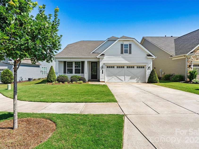 7315 Surprise Court, Charlotte, NC 28215.  MLS# CAR4276101, YatesRealty ID 23823. Tucked in a private cul-de-sac, this 3-Bedroom Cypress model shines with stunning curb appeal.