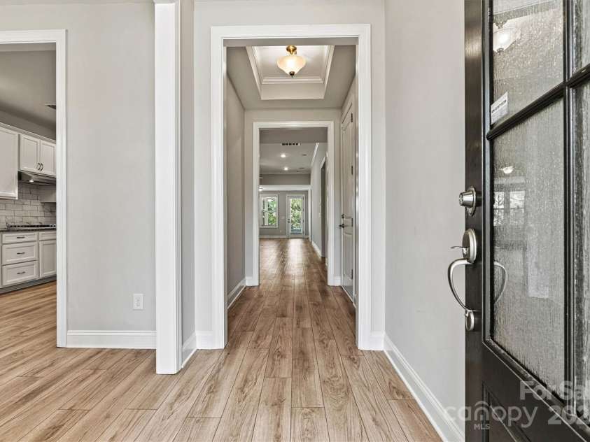 7315 Surprise Court, Charlotte, NC 28215.  MLS# CAR4276101, YatesRealty ID 23823. Upgraded front entry door with Rainglass adds style and privacy while letting plenty of natural light pour in.