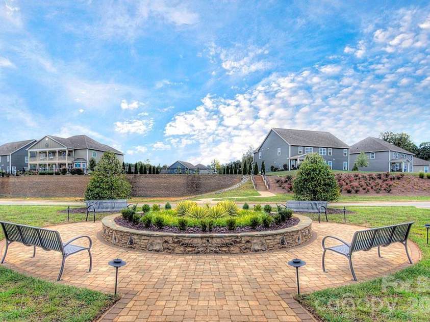 122 Boatwright Lane, Mooresville, NC 28117.  MLS# CAR4377794, YatesRealty ID 23826. Community sitting area