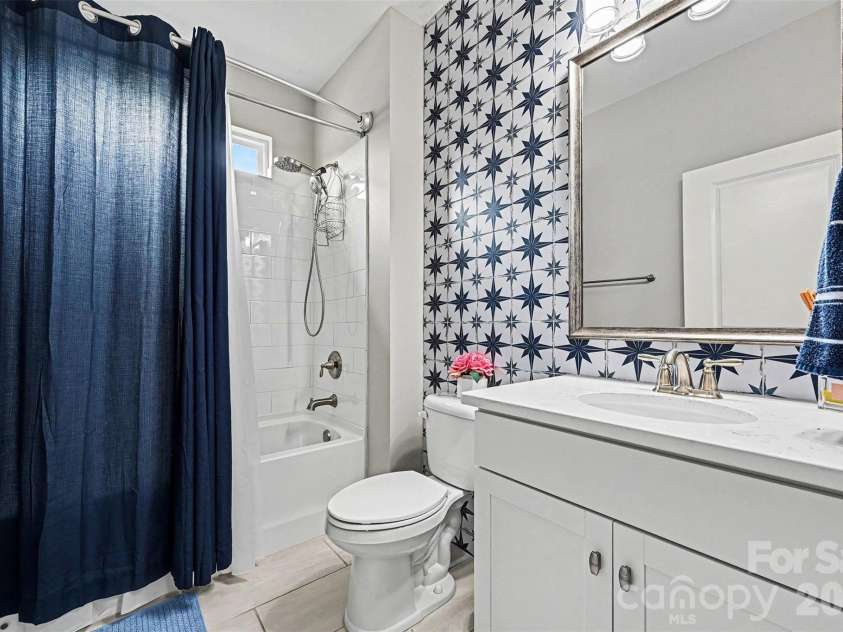 122 Boatwright Lane, Mooresville, NC 28117.  MLS# CAR4377794, YatesRealty ID 23826. Main level hall bathroom