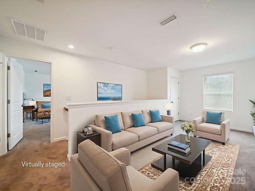 3077 Light Ridge Court, Concord, NC 28027.  MLS# CAR4274695, YatesRealty ID 23827. Loft on upper level has a large storage closet