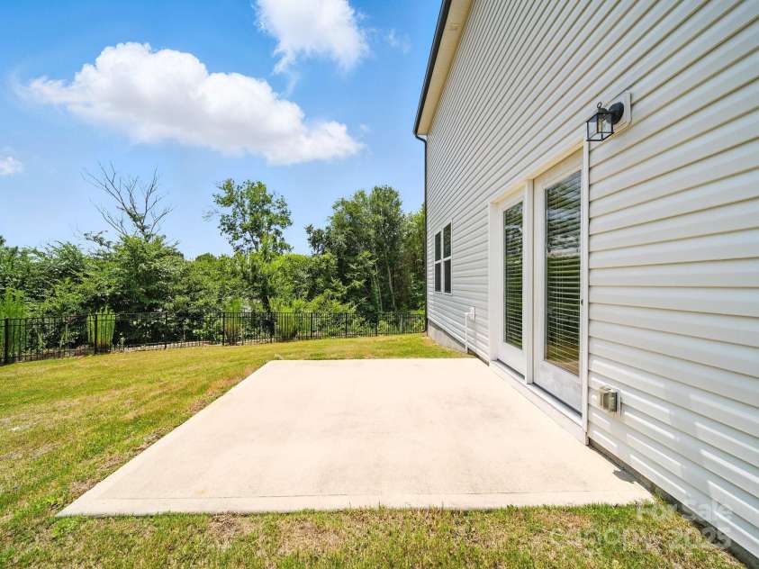 3077 Light Ridge Court, Concord, NC 28027.  MLS# CAR4274695, YatesRealty ID 23827. Rear patio