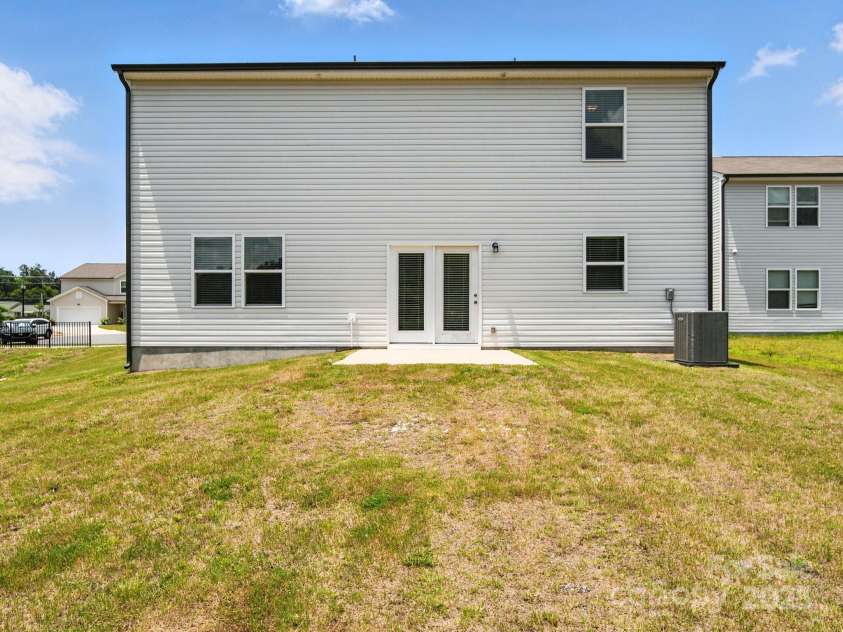 3077 Light Ridge Court, Concord, NC 28027.  MLS# CAR4274695, YatesRealty ID 23827. Rear yard and patio