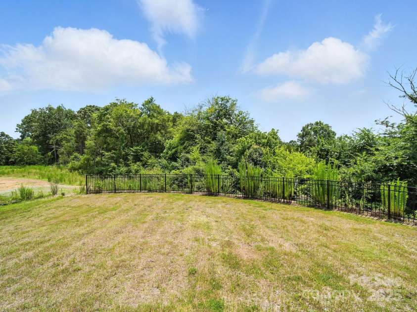 3077 Light Ridge Court, Concord, NC 28027.  MLS# CAR4274695, YatesRealty ID 23827. View of rear yard from patio