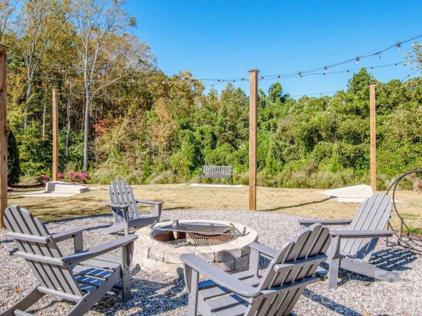 1270 Brawley School Road, Mooresville, NC 28117.  MLS# CAR4373576, YatesRealty ID 23829. Community Firepit