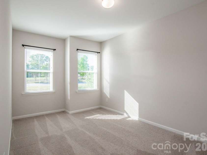 1270 Brawley School Road, Mooresville, NC 28117.  MLS# CAR4373576, YatesRealty ID 23829. Front Bedroom 3