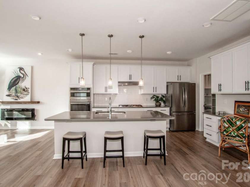 1270 Brawley School Road, Mooresville, NC 28117.  MLS# CAR4373576, YatesRealty ID 23829. Large quartz island