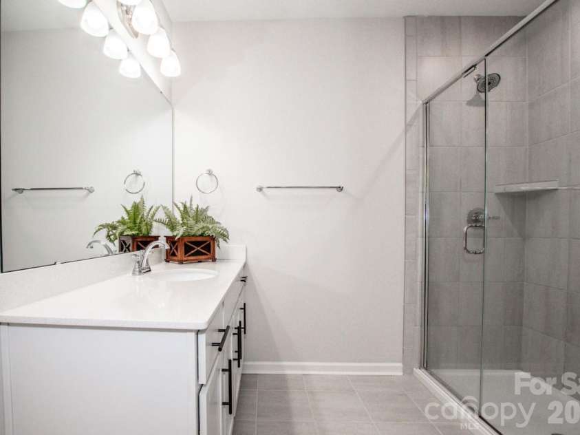 1270 Brawley School Road, Mooresville, NC 28117.  MLS# CAR4373576, YatesRealty ID 23829. Primary walk-in shower