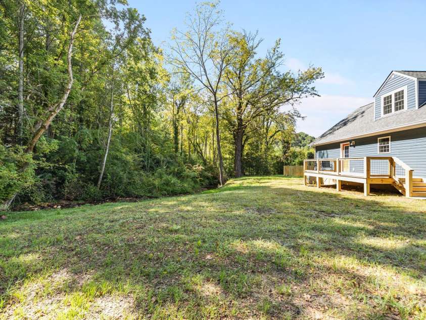 215 McCoy Cove, Black Mountain, NC 28711.  MLS# CAR4333033, YatesRealty ID 2383. Flat back yard!