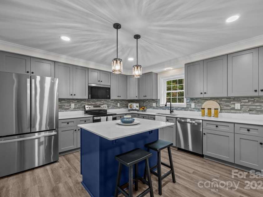 215 McCoy Cove, Black Mountain, NC 28711.  MLS# CAR4333033, YatesRealty ID 2383. Huge kitchen with island!