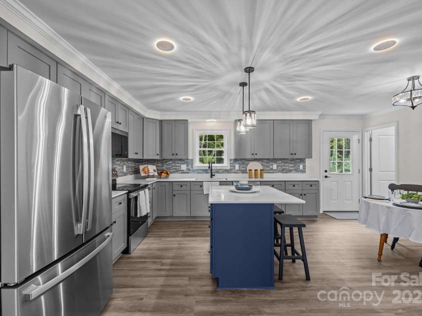 215 McCoy Cove, Black Mountain, NC 28711.  MLS# CAR4333033, YatesRealty ID 2383. Large kitchen with recessed lighting and island. 