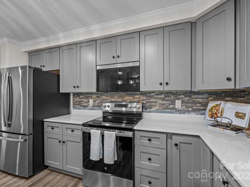 215 McCoy Cove, Black Mountain, NC 28711.  MLS# CAR4333033, YatesRealty ID 2383. Tons of storage!