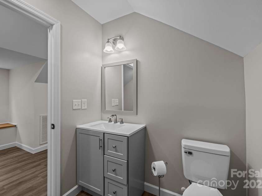 215 McCoy Cove, Black Mountain, NC 28711.  MLS# CAR4333033, YatesRealty ID 2383. Upstairs full bathroom with shower