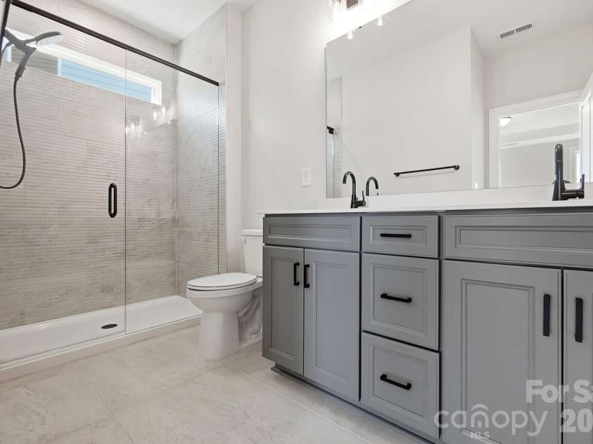 3077 Founding Fathers Drive, Gastonia, NC 28056.  MLS# CAR4335380, YatesRealty ID 23830. Primary Bathroom