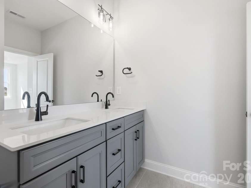 3077 Founding Fathers Drive, Gastonia, NC 28056.  MLS# CAR4335380, YatesRealty ID 23830. Primary Bathroom