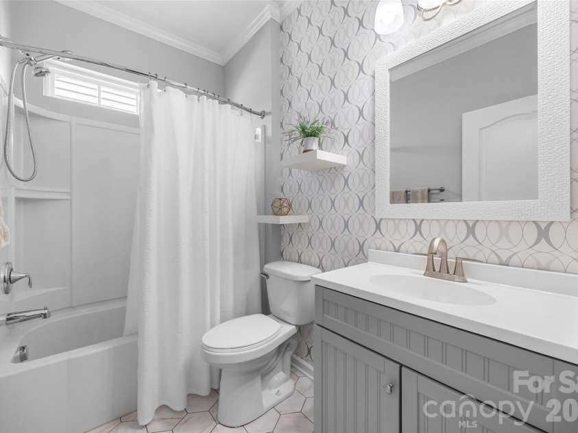 1521 Deer Meadows Drive, Waxhaw, NC 28173.  MLS# CAR4367982, YatesRealty ID 23831. Guest bathroom on main level