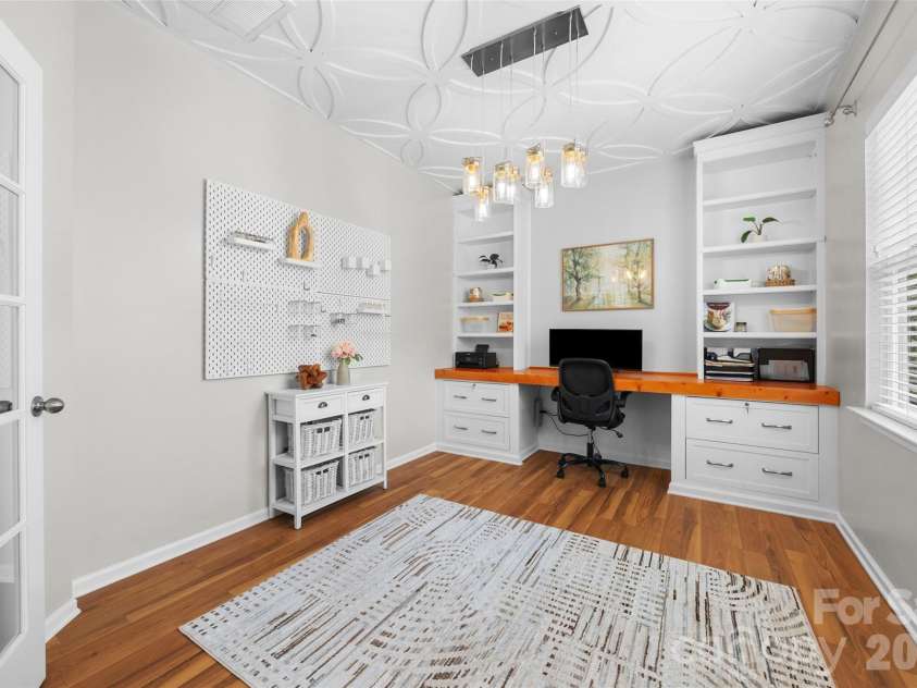 1521 Deer Meadows Drive, Waxhaw, NC 28173.  MLS# CAR4367982, YatesRealty ID 23831. Office on main level with built-ins, French doors and custom millwork on ceiling