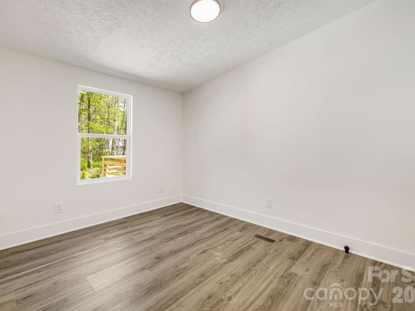 4 Woodscape Drive, Mills River, NC 28759.  MLS# CAR4372590, YatesRealty ID 23832. Bedroom 2