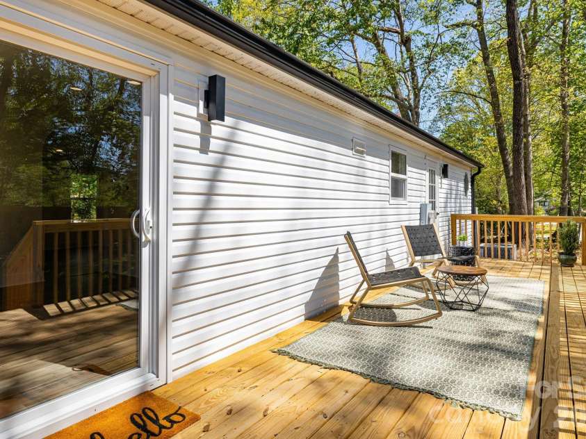 4 Woodscape Drive, Mills River, NC 28759.  MLS# CAR4372590, YatesRealty ID 23832. Entertain with ease on the new expansive deck