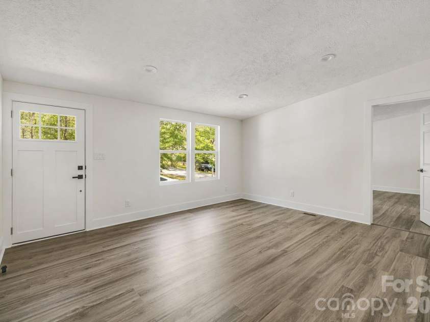 4 Woodscape Drive, Mills River, NC 28759.  MLS# CAR4372590, YatesRealty ID 23832. Fresh flooring & paint throughout