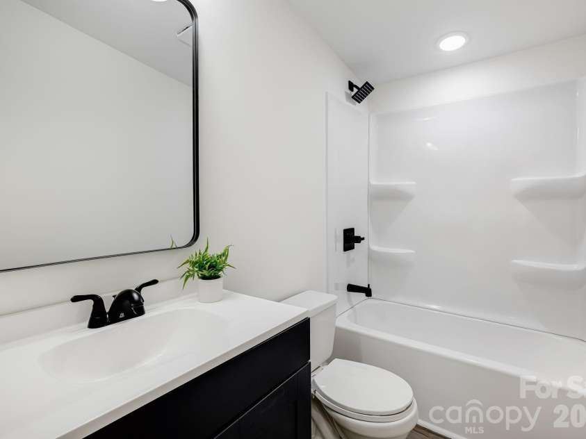 4 Woodscape Drive, Mills River, NC 28759.  MLS# CAR4372590, YatesRealty ID 23832. Guest Bathroom