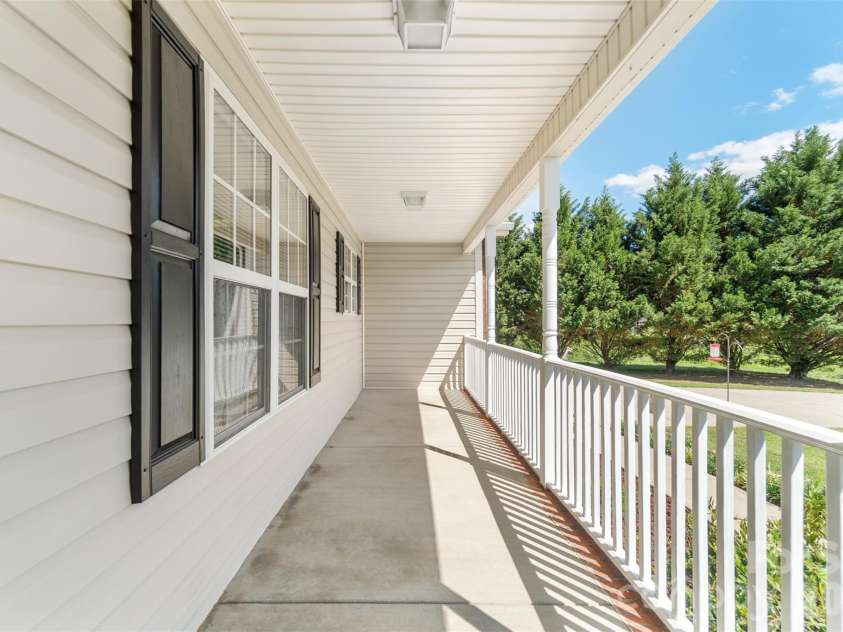 202 Big Dipper Court, Wingate, NC 28174.  MLS# CAR4382477, YatesRealty ID 23833. Front porch