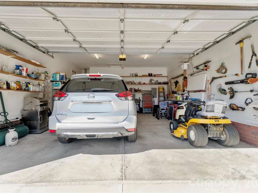 202 Big Dipper Court, Wingate, NC 28174.  MLS# CAR4382477, YatesRealty ID 23833. Garage w/shelving built-in