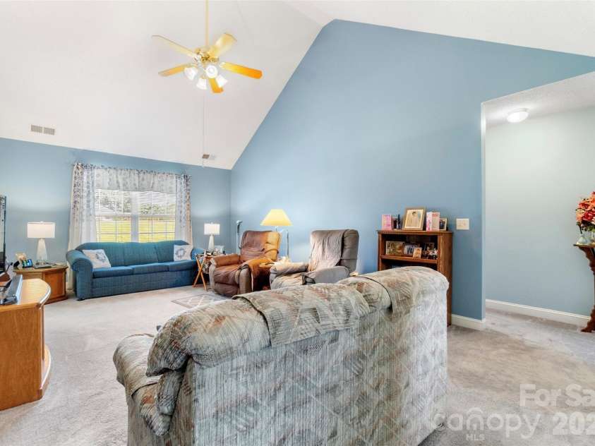202 Big Dipper Court, Wingate, NC 28174.  MLS# CAR4382477, YatesRealty ID 23833. Great room w/vaulted ceiling