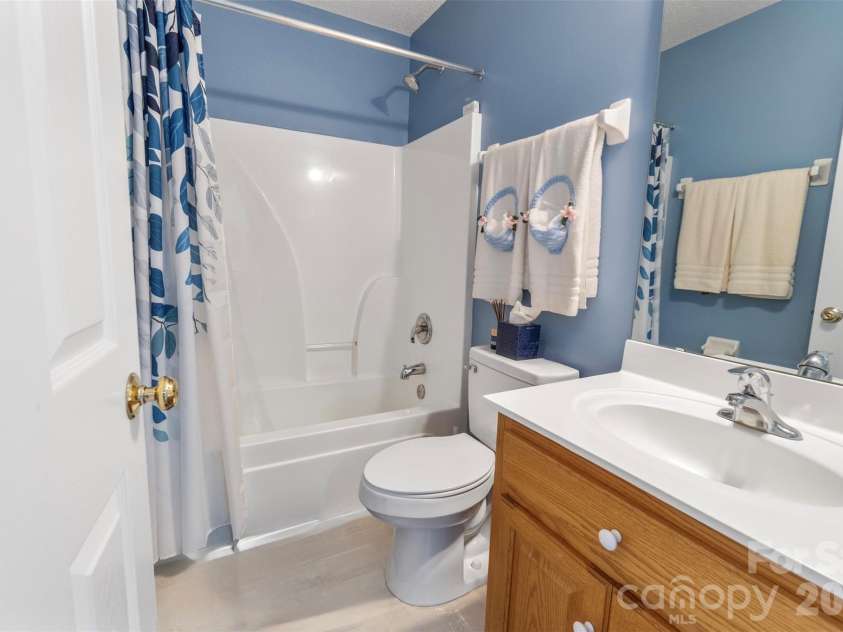 202 Big Dipper Court, Wingate, NC 28174.  MLS# CAR4382477, YatesRealty ID 23833. Hall bathroom