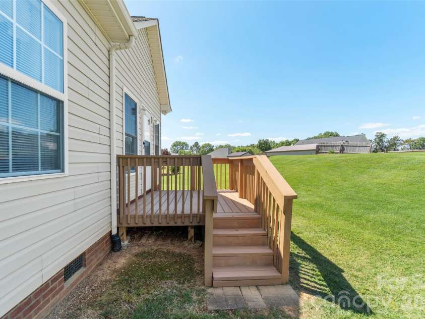 202 Big Dipper Court, Wingate, NC 28174.  MLS# CAR4382477, YatesRealty ID 23833. Rear deck