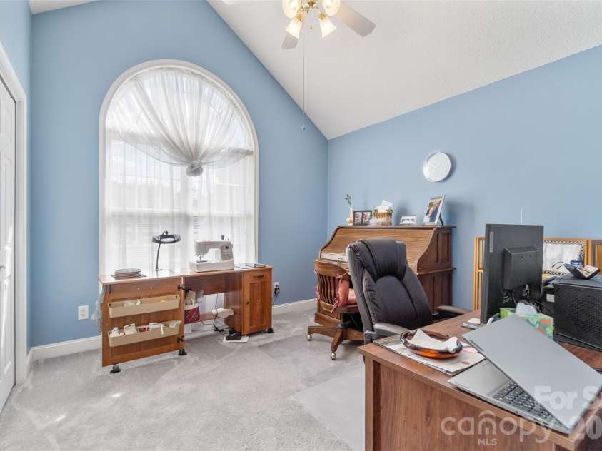 202 Big Dipper Court, Wingate, NC 28174.  MLS# CAR4382477, YatesRealty ID 23833. Secondary bedroom w/vaulted ceiling