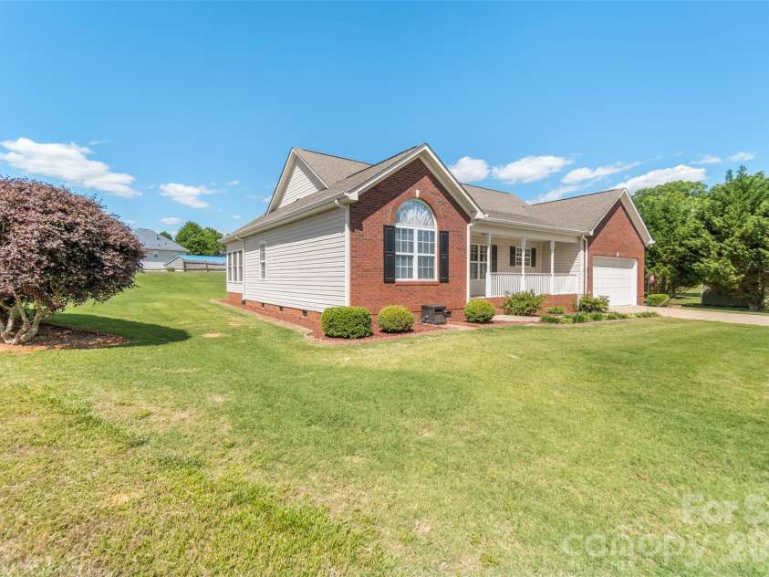 202 Big Dipper Court, Wingate, NC 28174.  MLS# CAR4382477, YatesRealty ID 23833. Side view - Front
